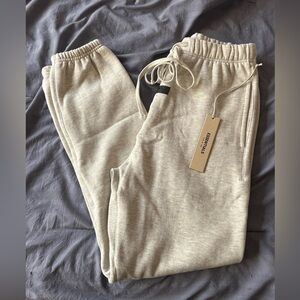 Fear of God Essentials Light Oatmeal Joggers